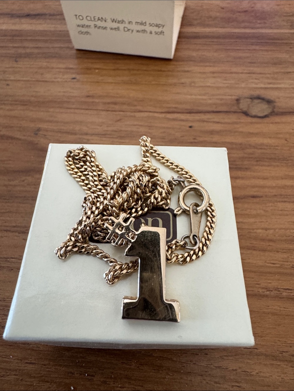 VINTAGE 1983 Avon Gold Tone #1 Pendant Necklace